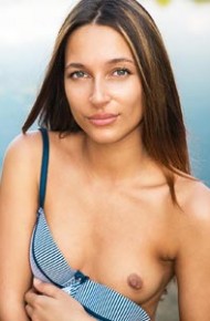Lakeside Brunette shows Pussy