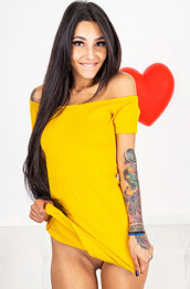 Kitty Carrera Takes off her Yellow Dress