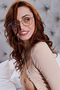 Morrigan Leggy Redhead with Glasses