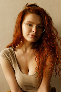 Kari Pitinova Hot Busty Redhead with Glasses